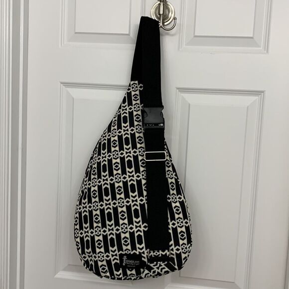 Initials Sling Backpack NWOT black & white with adjustable wide strap - Picture 2 of 9
